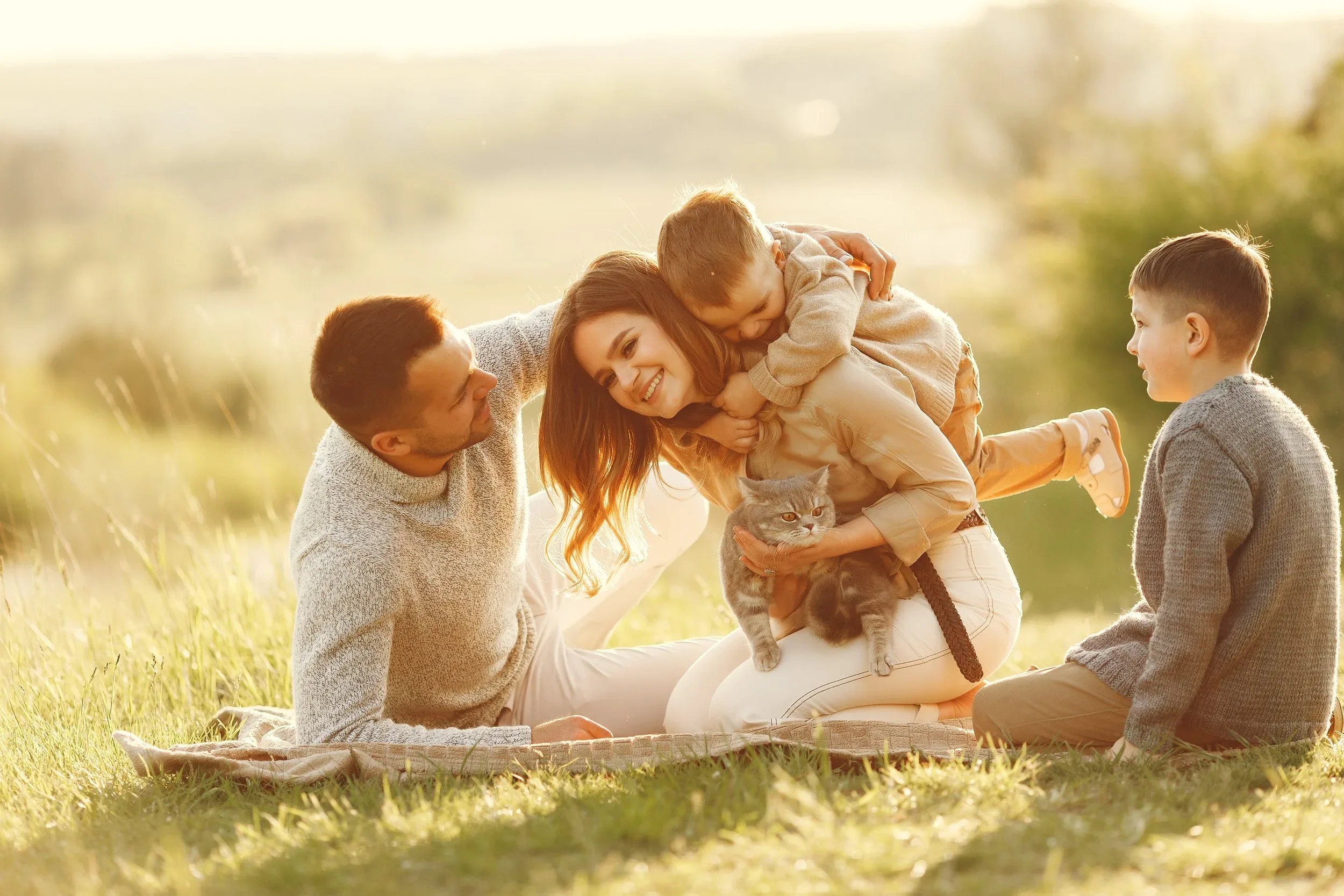 Cute Family Playing Summer Field - Special Needs Planning Lawyer in Pleasanton